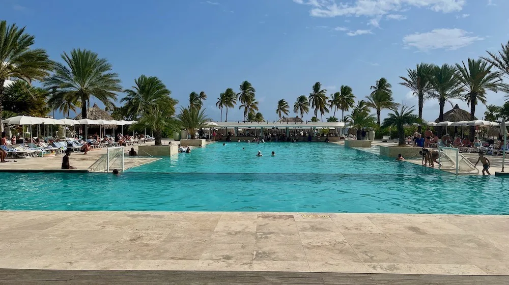 the large pool is the center of activity at mangrove beach corendon all-inclusive resort near willemstad.