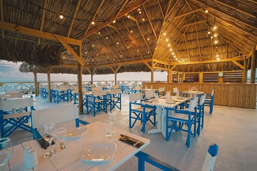 tavern seafood, one of four sit-down restaurants at mangrove beach resort by hilton curio