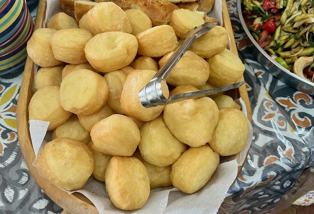 fried baursak rolls are a common site at every meal in kazakhstand and are a very kid-friendly food.