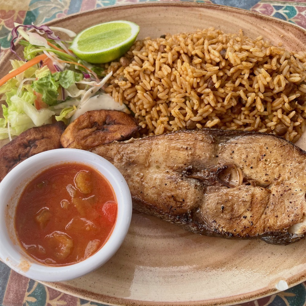 Fresh fish with a creole sauce and rice and peas, a typical curacao lunch.