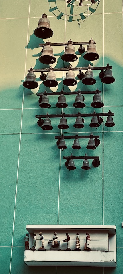 this glockenspieal with bells and moving figures hangs on a small square near the water in willemstad.