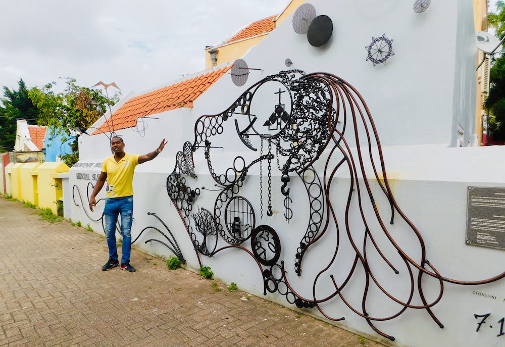 this 3-d metal mural is a tribute to bob marley on a backstreet of otrabanda, willemstaad.