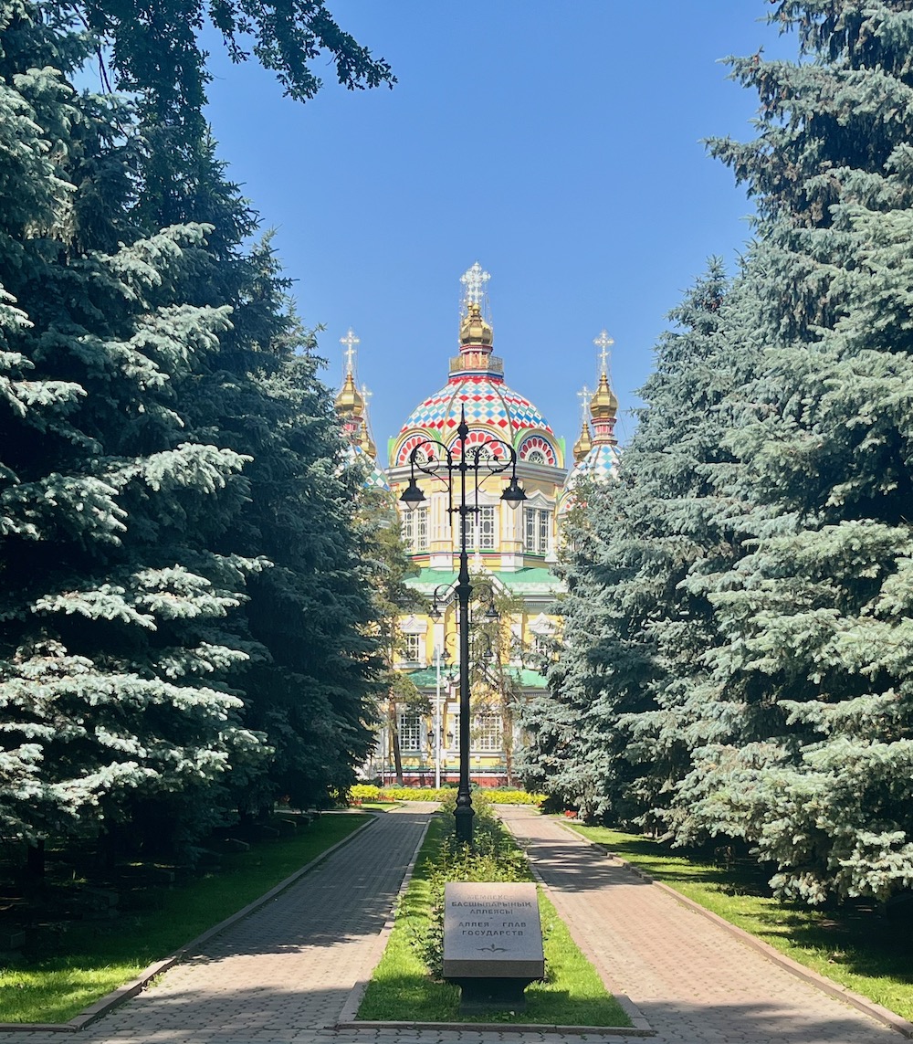 Zenkov cathedral stands out in almaty's panfilov park with its doam and easter-egg colors