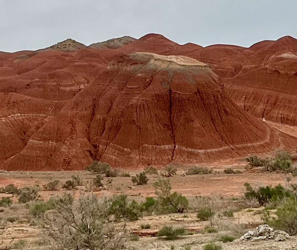 The red mountains and scrub brush of altyn-emel national park in kazakhstan can remind one of the american west.