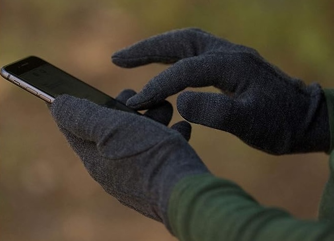 glove liners you can wear while using your phone are handy when you are running around town in winter. 