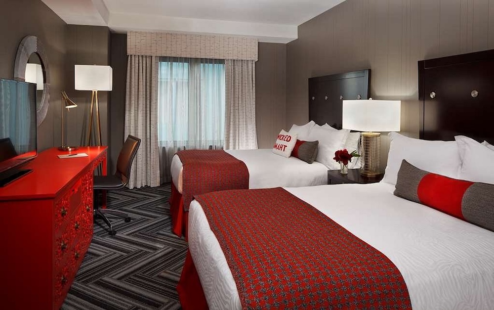 A stylish but compact double room at the onyx downton, a hilton curio hotel in boston.