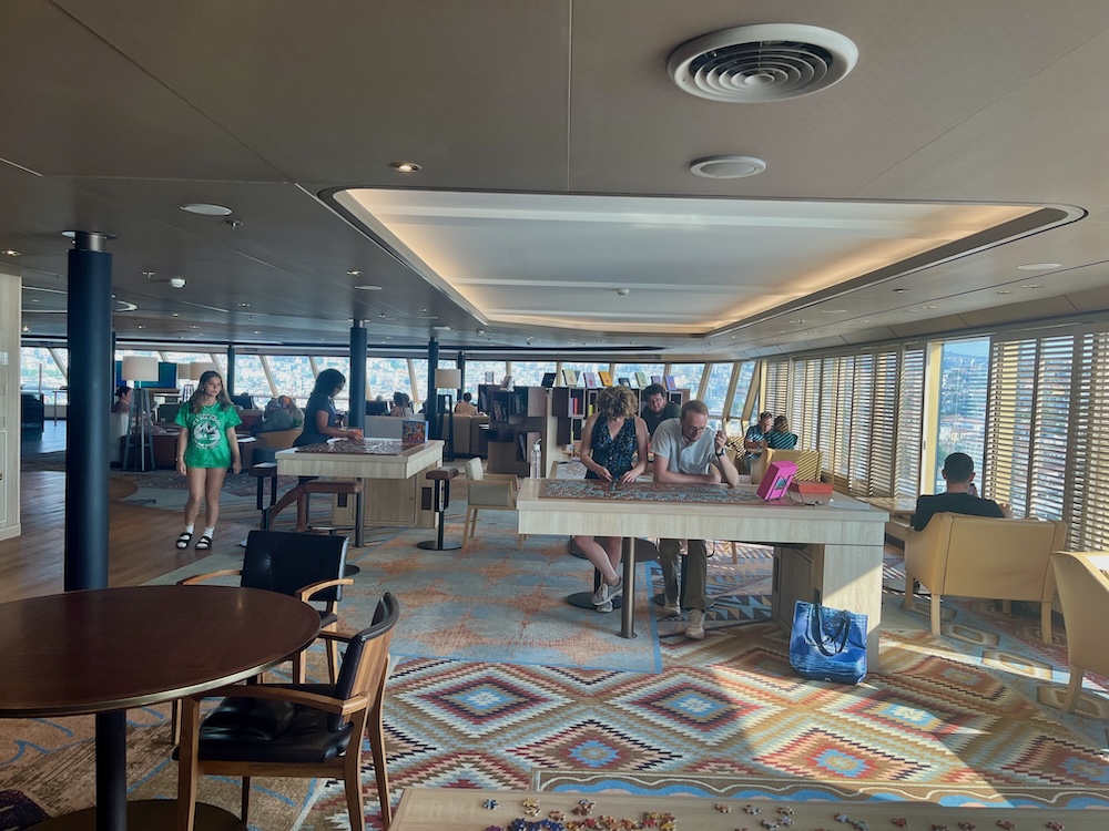 The crow's nest on hoilland america vista-class ships is a great place to play games, do puzzles, read or sit and admire a front-seat view.