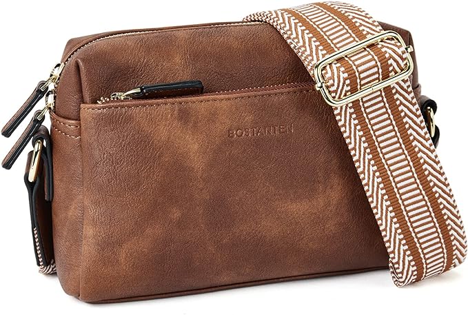 This small cross body bag holds all your essential items and has a thick trap with unique designs.