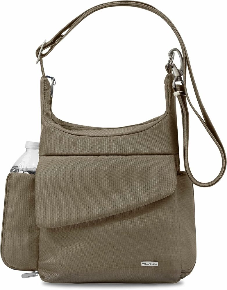 this crossbody bag is one of the best travel bags for moms because of its hidden back pocket and rfid protection. 