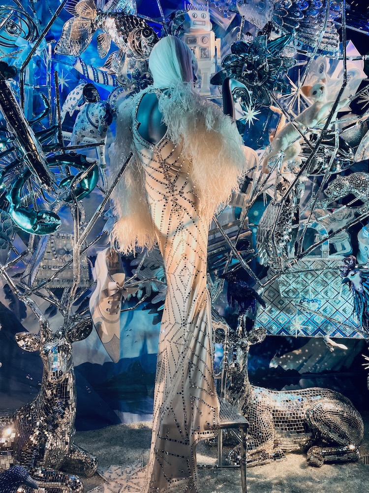 Bergdorf goodman's holiday windows are always outrageous. Like the father winter made from fir and clothes and surrounded by silver trees and animals.