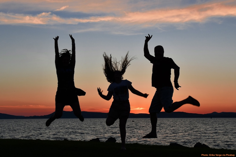 Family jumping happy