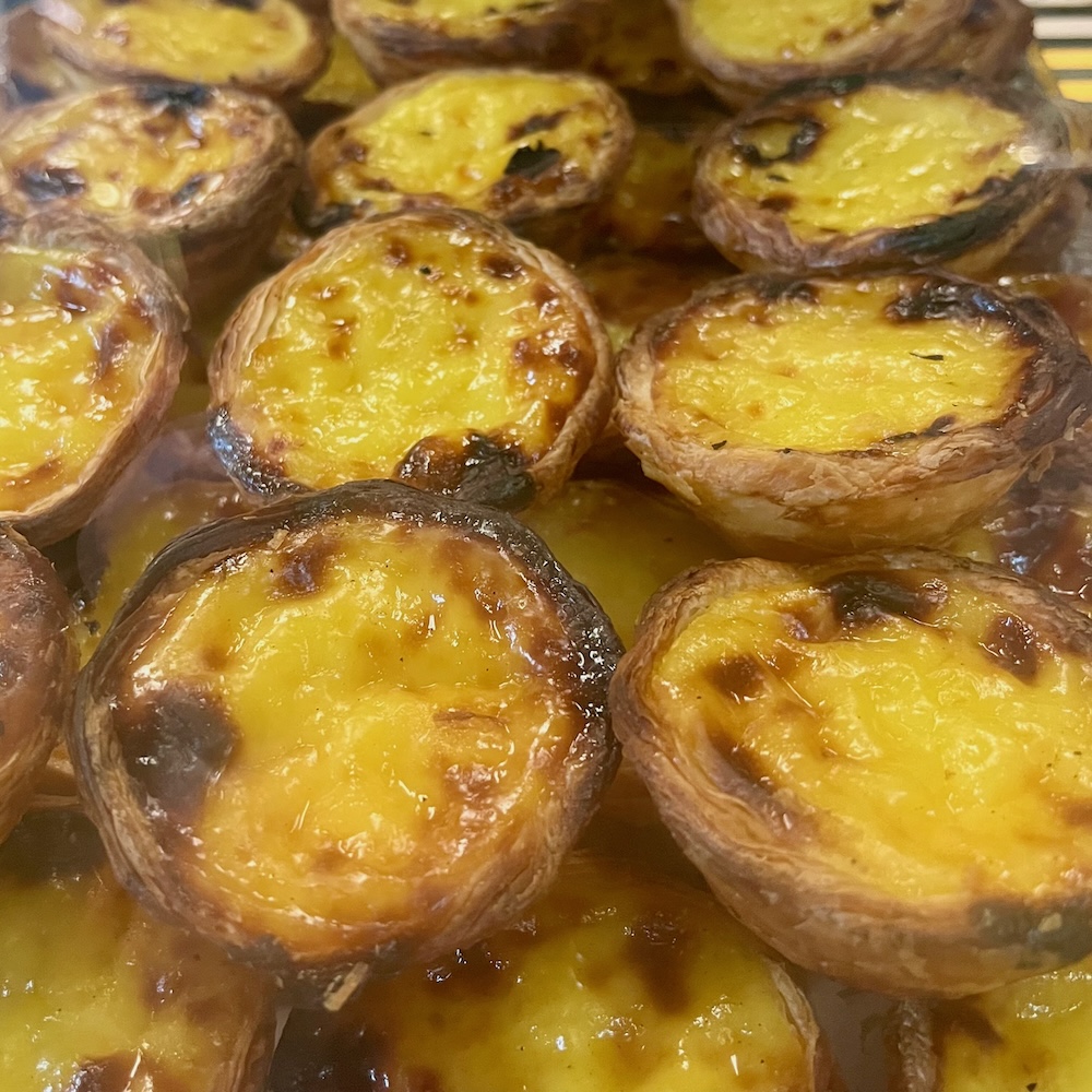 Custard tarts, made with egg yolks, sugar and vanilla are common site in toronto bakeries and a typical food tour sample.