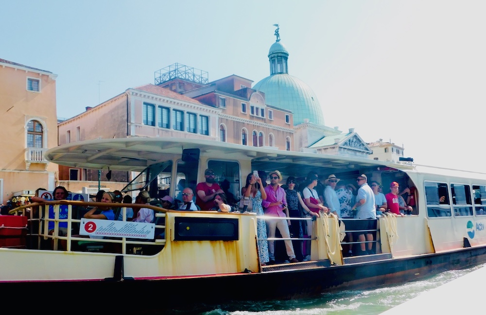 Vaporettos, buses on water, are the cheapest way to get around venice and are packed with residents and tourist in the summer.