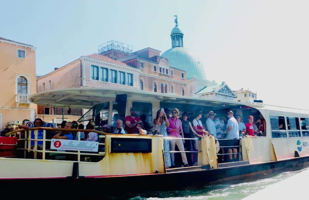 vaporettos, buses on water, are the cheapest way to get around venice and are packed with residents and tourist in the summer.