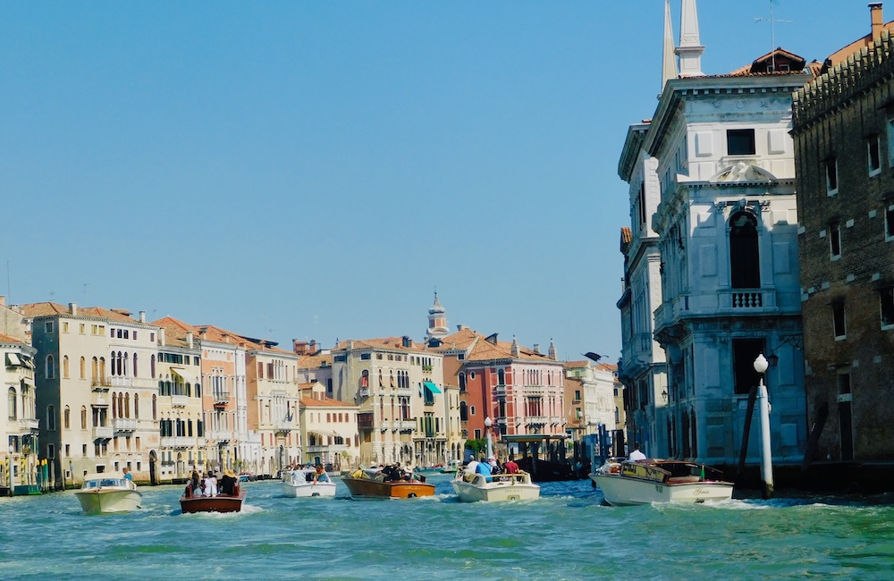 Riding down the busy grand canal is one of the best things to do with teens in venice.