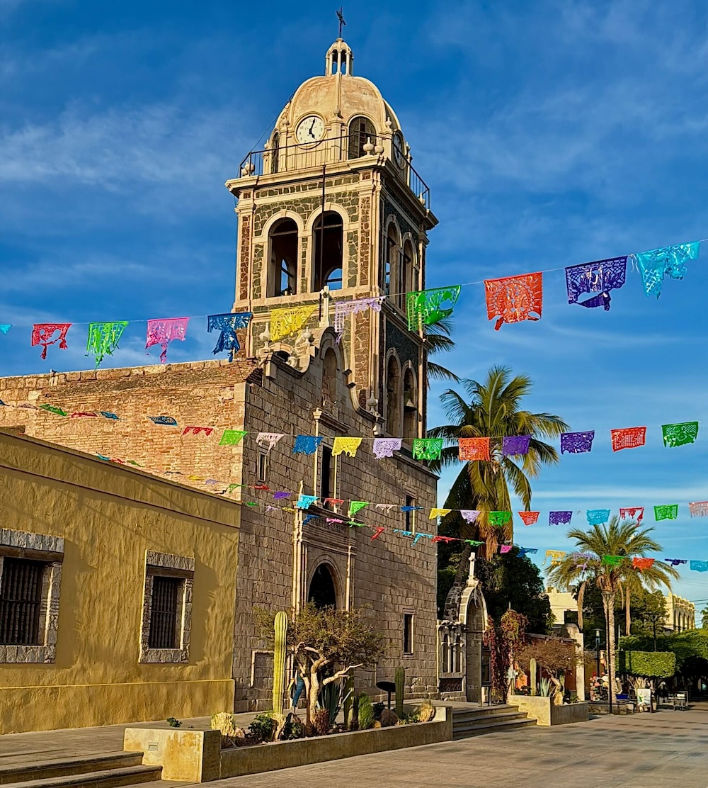 Our lady of loreto mission sits on the towns main plaza. Visiting missions is a unique cultural thing to do with older kids in loreto.