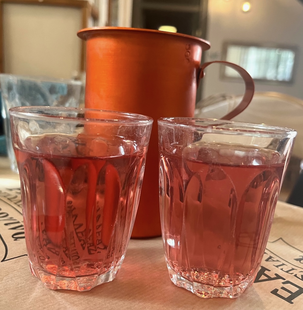 Wine is often served in greece from narrow tin pitchers into small tumblers.