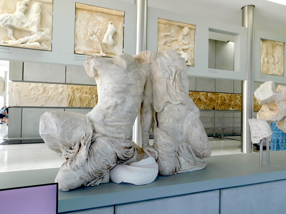 some of the many partial carvings, statues and facades you can see at the acropolis museum in athens.