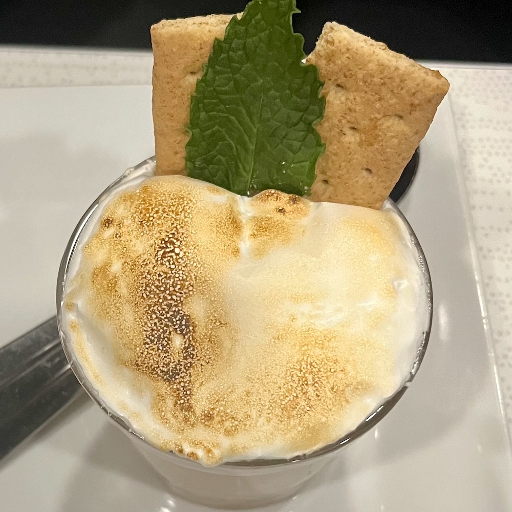 The homemade chocolate mousse at nervana game café has graham crackers and a toasted marshmallow top.
