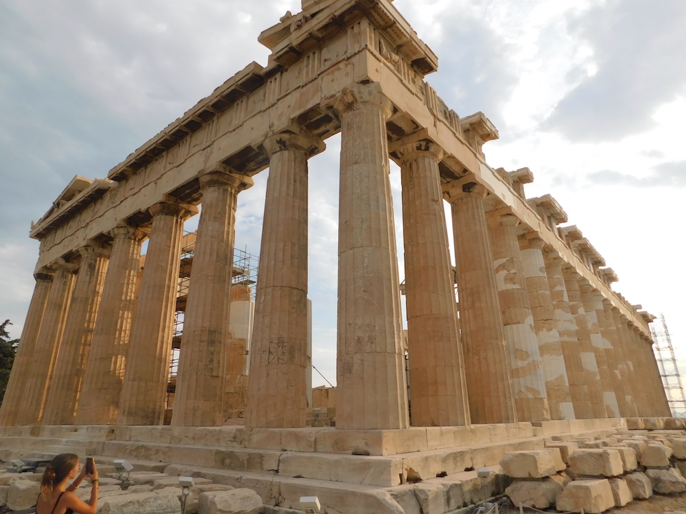 The parthenon on the acropolis in athens, at dusk.