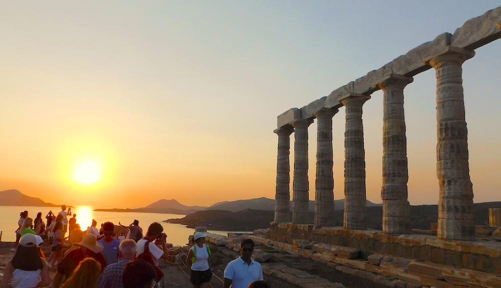 Watching the sunset at the temple of poseidon is one of the best things to do with teens in greece