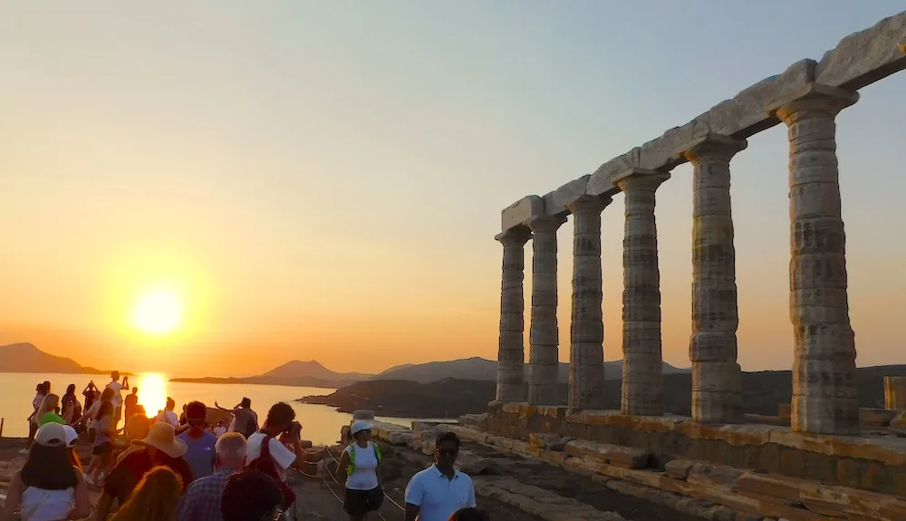 watching the sunset at the temple of poseidon is one of the best things to do with teens in greece