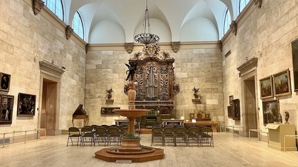 the european rooms at the memorial art gallery include this open space with its high ceilings, paintings and this full-size italian baroque  organ. 