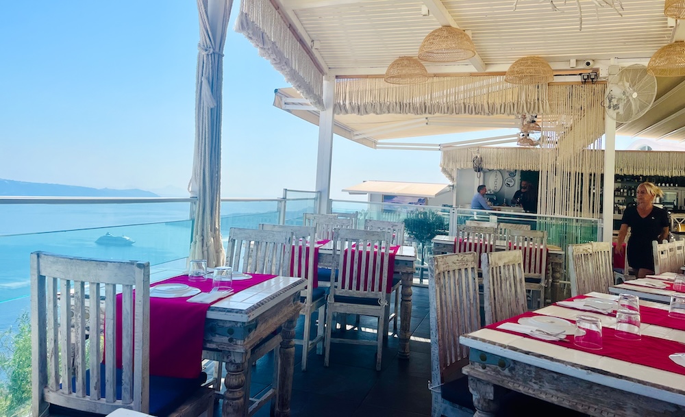 A port day in santorini isn't complete without eating local greek seafood with a view like the one from the terrace of 1500 bc