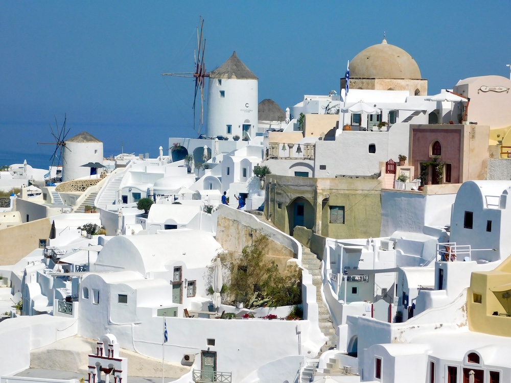 Old and old-style windmills are a common sight on greek islands like santorini