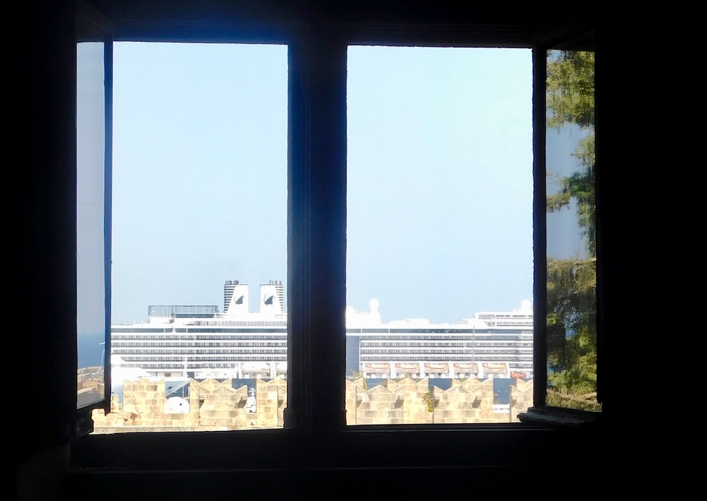 A view of the holland america oosterdam from the house of the grand master in the medieval old town on rhodes
