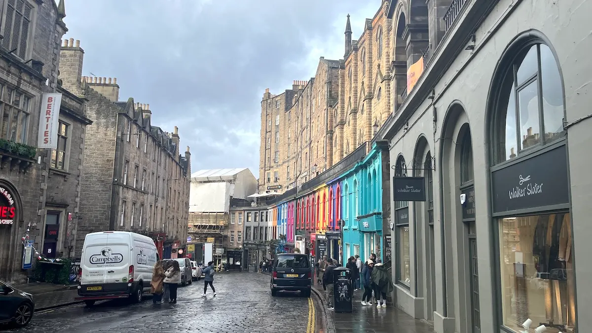 Edinburgh: 18+ Stellar Things To Do, See & Eat With Kids: Curving Victoria Street adds a splash of color to gray Edinburgh