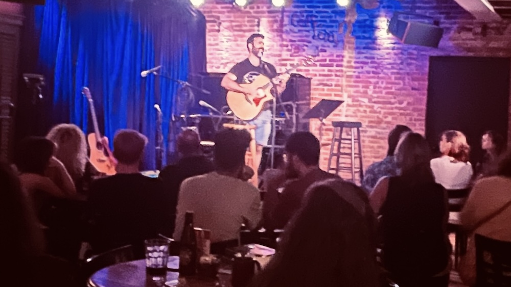 Open-mic night at caffe lena is a one of the coolest things to  do on a couple's weekend in saratoga springs.